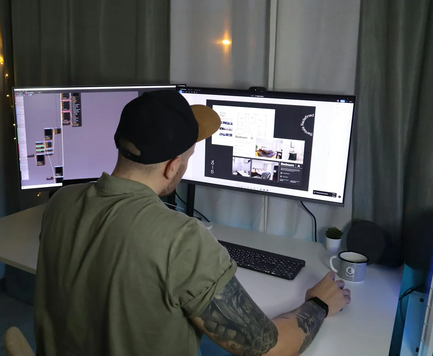 Designer building a website on a large monitor